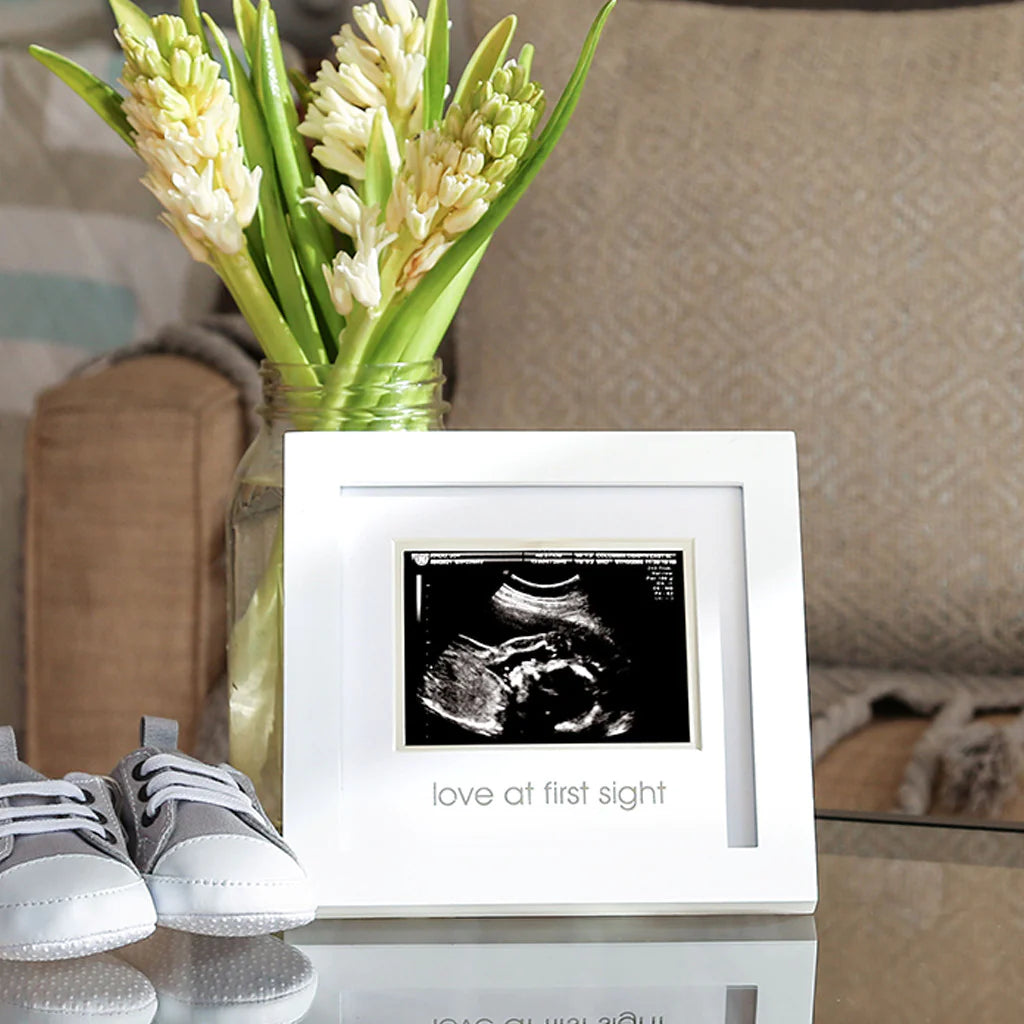 Celebrate your bundle of joy with Pearhead's sonogram frame! Comes with an easel and sawtooth hanger, plus an acid-free beveled mat for your precious 3