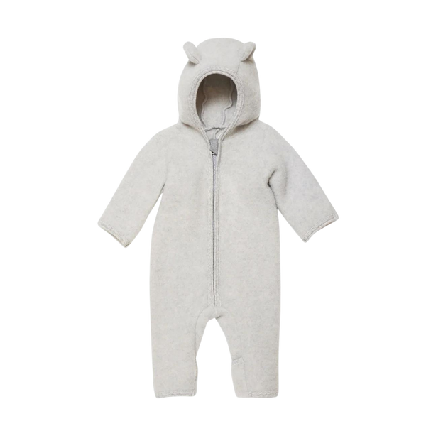 Soft and comfortable, this breathable jumpsuit will keep your little one warm and dry. Fold over mitts, and convertible footie. Made from merino wool, it can be worn indoors or out. Designed in Denmark, Made in Poland.

- 100% merino wool

- OEKO-tex certified

Size chart

2-4 months = 56/62
6-9 months = 68/74
Ships to US and Canada Duty Free