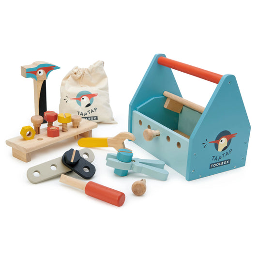 A Tender Leaf Toys branded woodpecker themed tool box filled with everything you need to build something on your own. With two removable lid pieces that turn into screwable plates, and a cloth printed bag to pack away after play, this set includes a woodpecker hammer, a pair of pliers, a screwdriver, a spanner, 2 screws, 2 bolts, 2 planks, 4 nuts, and 4 pegs. We have even included a chalkboard on one end of the box to record your inventions.